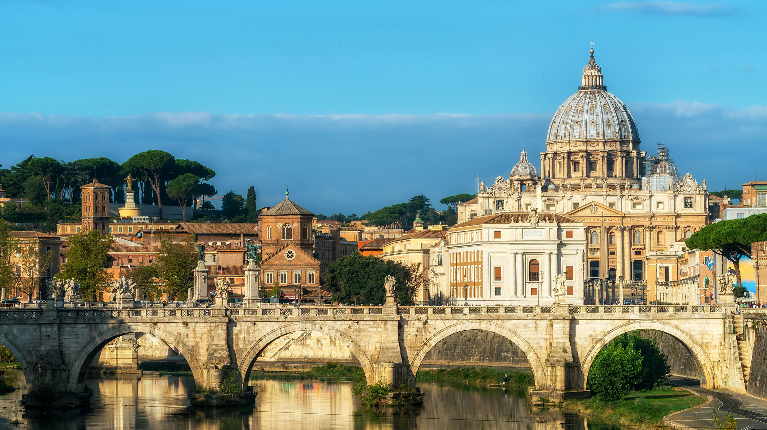 St Peter Basilica and St Angelo Bridge crossing Tiber River
