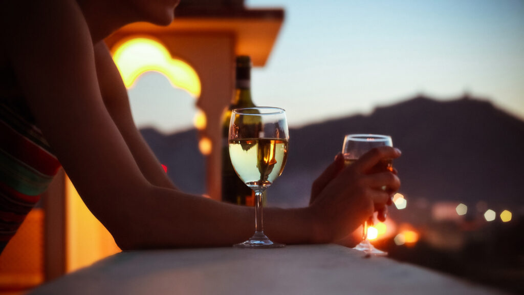 Sipping wine as the sun melts into India’s horizon